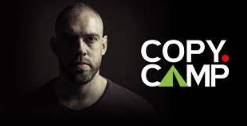 Capa do curso COPYCAMP Remix com o título "COPYCAMP Remix: Baixe Agora" e elementos visuais que remetem a marketing digital e conversão.